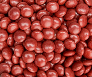 Chokoladelinser (100 g), assorterede, enkeltfarvede, brune (som Smarties)